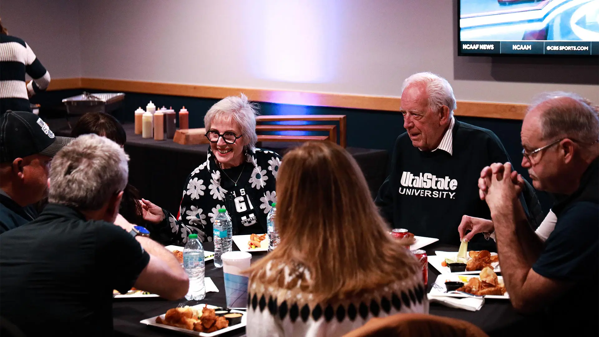Fans enjoying a meal in the Courtside Club hospitality area
